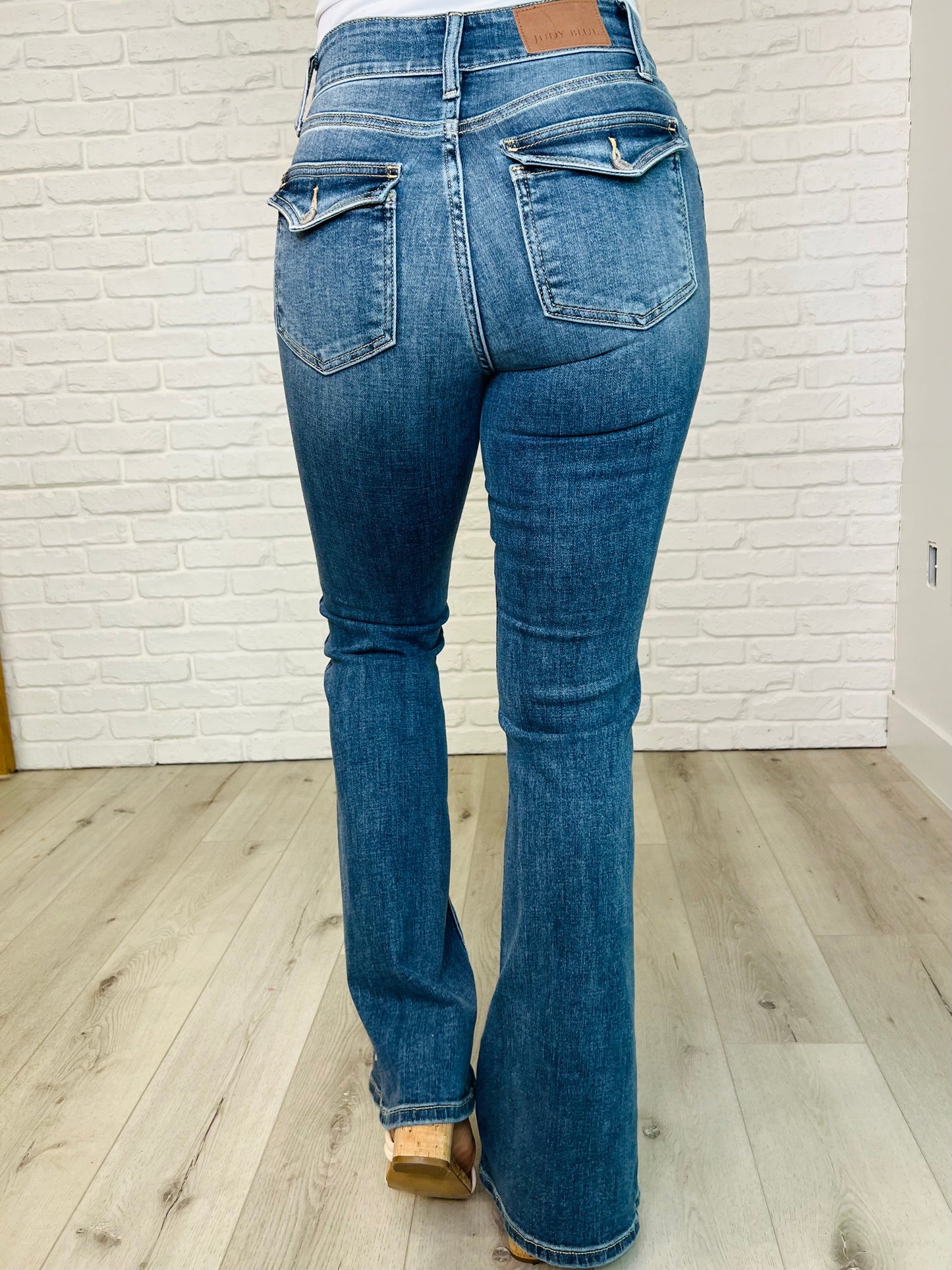 JUDY BLUE Ariana High Rise Double Button Waistband Flare Jeans at THE FAD