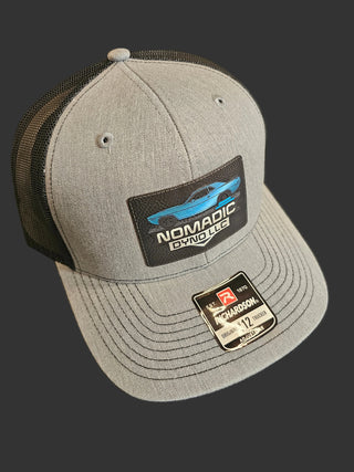 Grey cap with brand logo on a black patch Nomadic Dyno